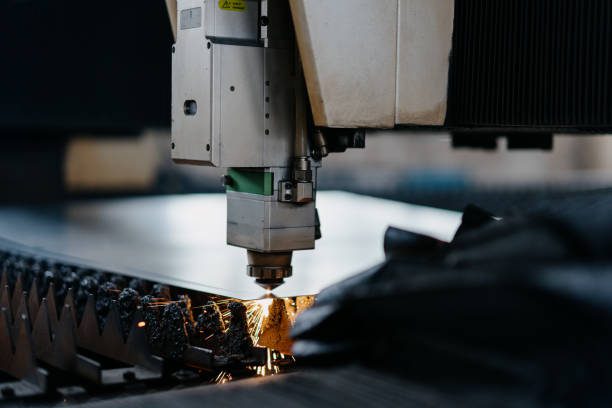 A laser cutting machine working on metal.